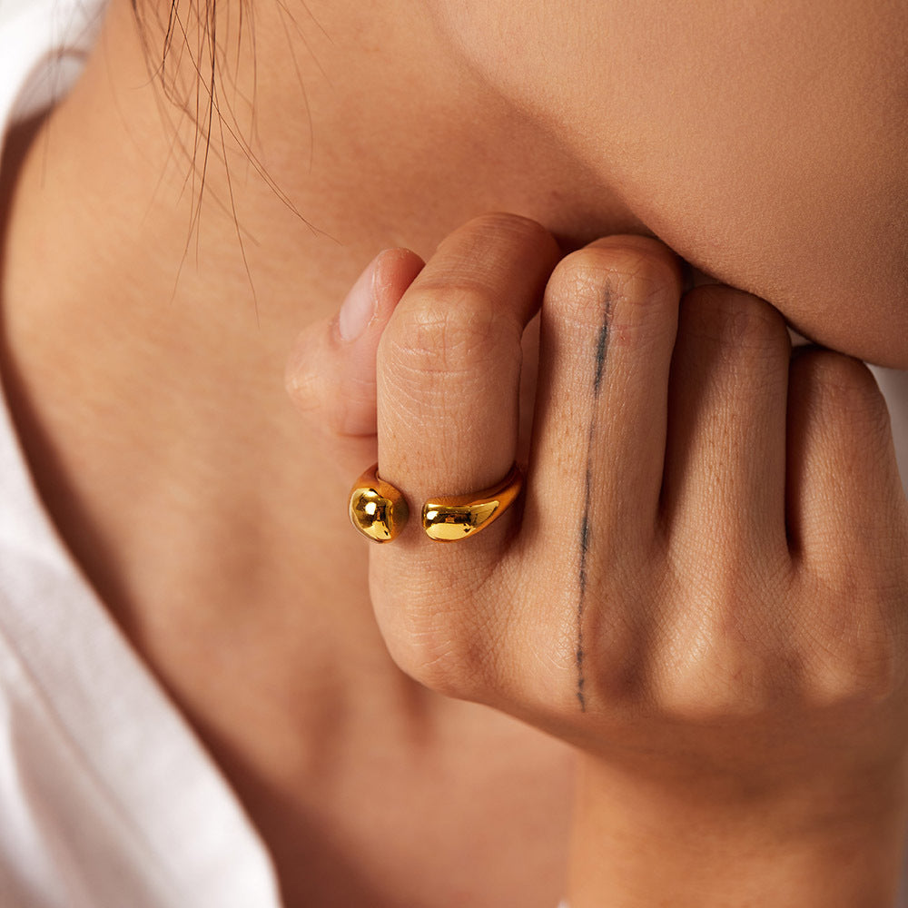 Sleek Asymmetric Teardrop Open Ring